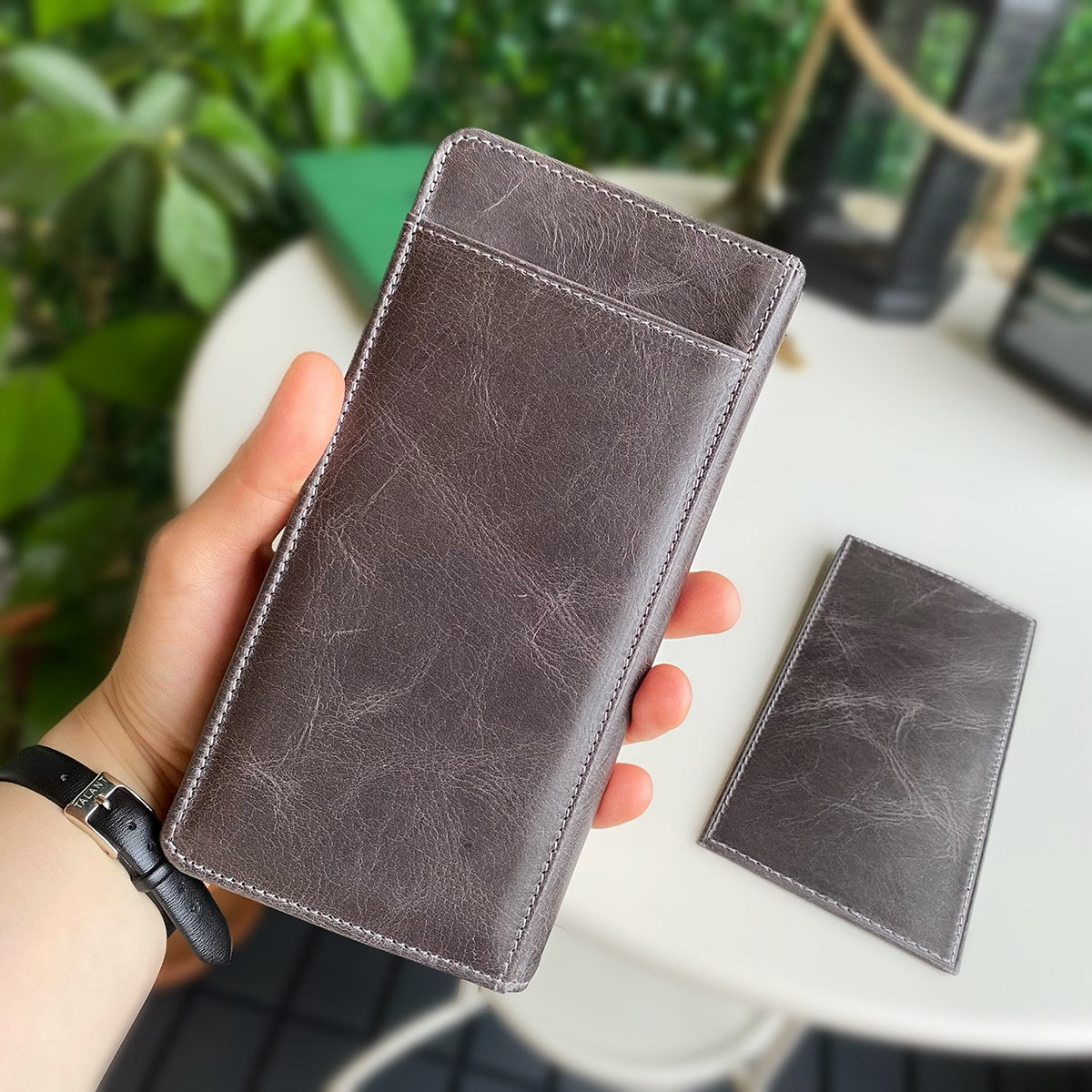 Boston Genuine Leather Wallet featuring a phone socket and multiple compartments in a stylish design.