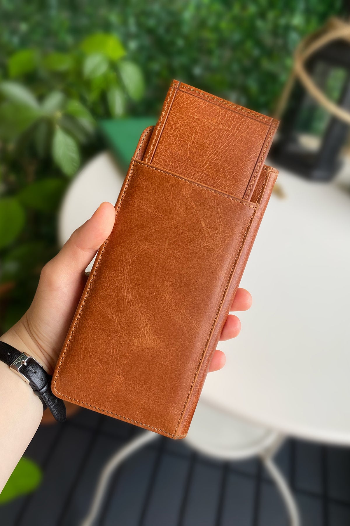 Boston Genuine Leather Wallet featuring a phone socket and multiple compartments in a stylish design.