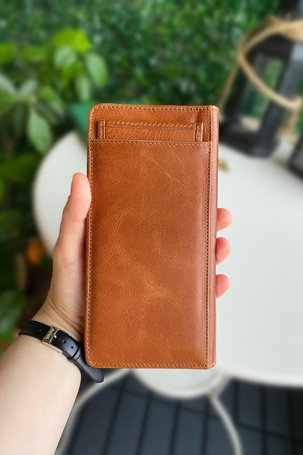 Boston Genuine Leather Wallet featuring a phone socket and multiple compartments in a stylish design.