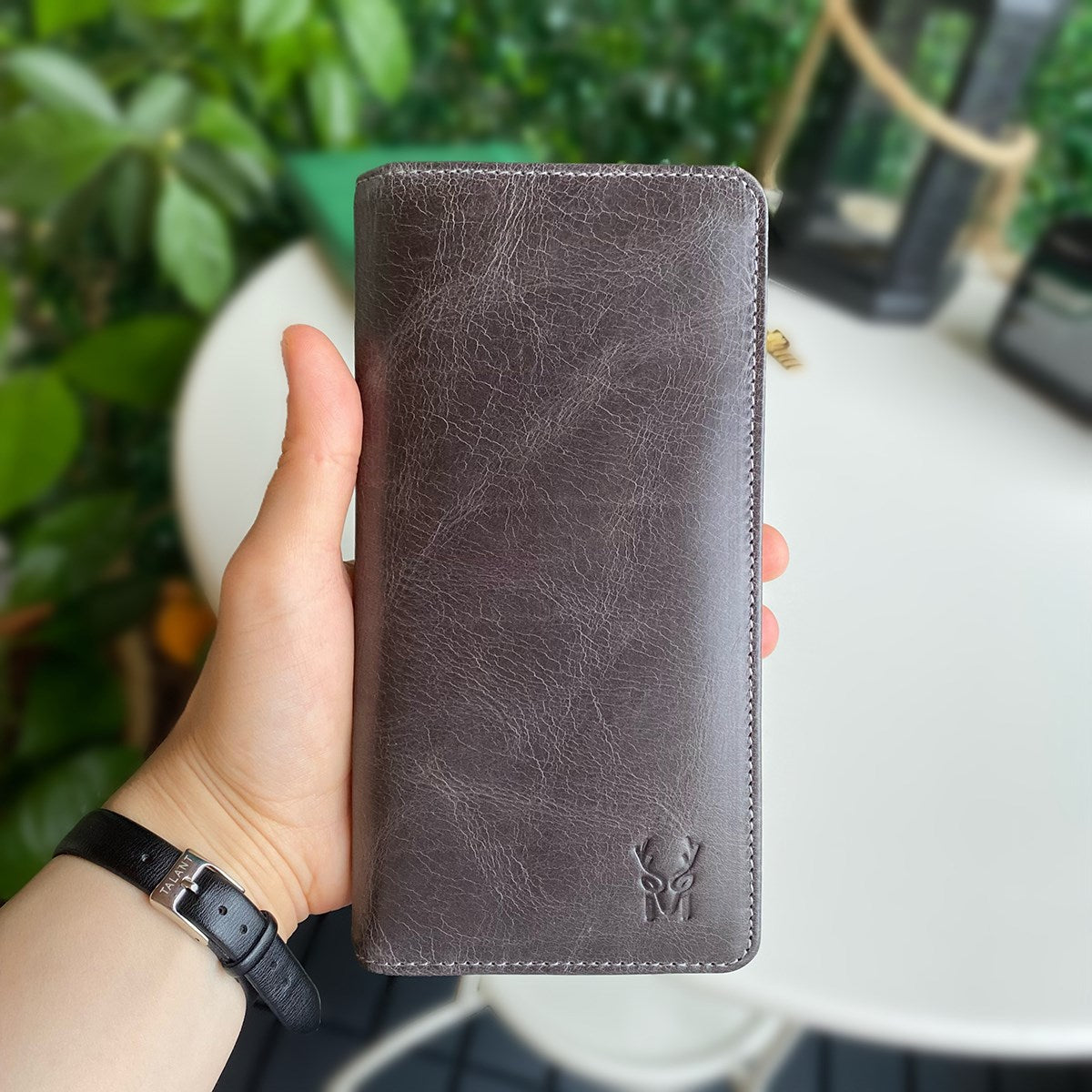 Boston Genuine Leather Wallet featuring a phone socket and multiple compartments in a stylish design.