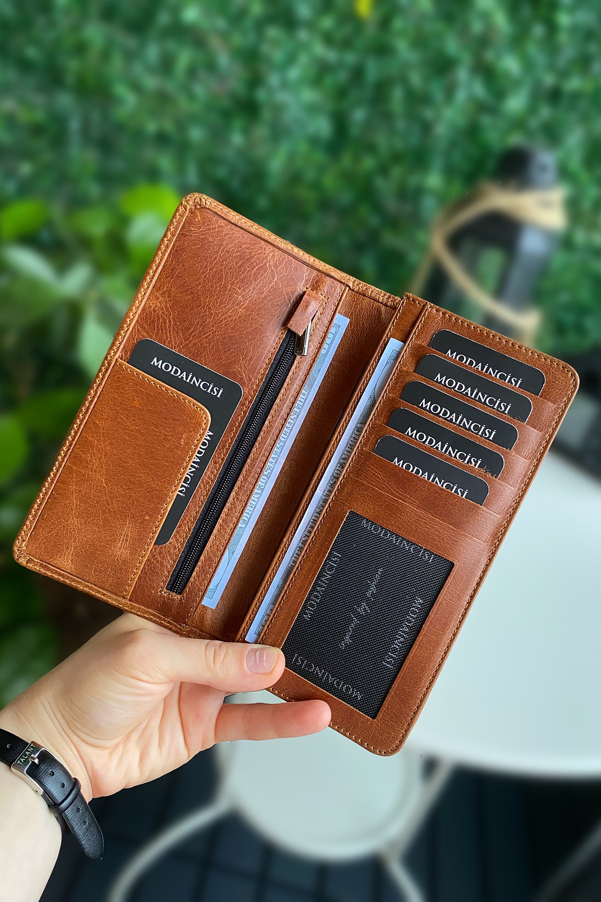 Boston Genuine Leather Wallet featuring a phone socket and multiple compartments in a stylish design.
