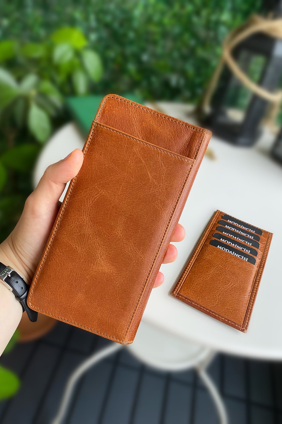 Boston Genuine Leather Wallet featuring a phone socket and multiple compartments in a stylish design.