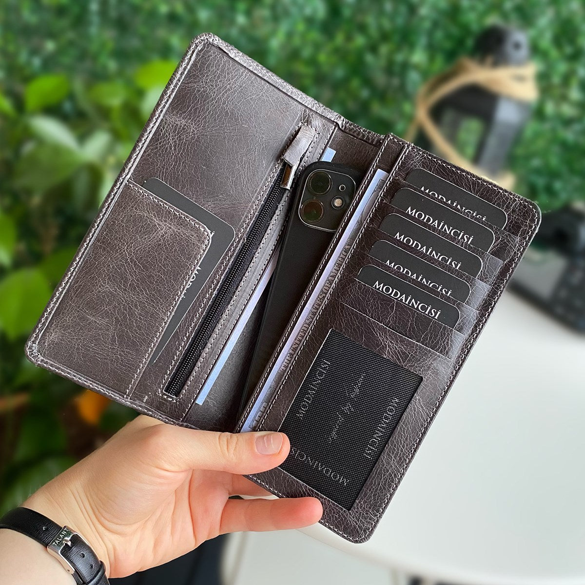 Boston Genuine Leather Wallet featuring a phone socket and multiple compartments in a stylish design.