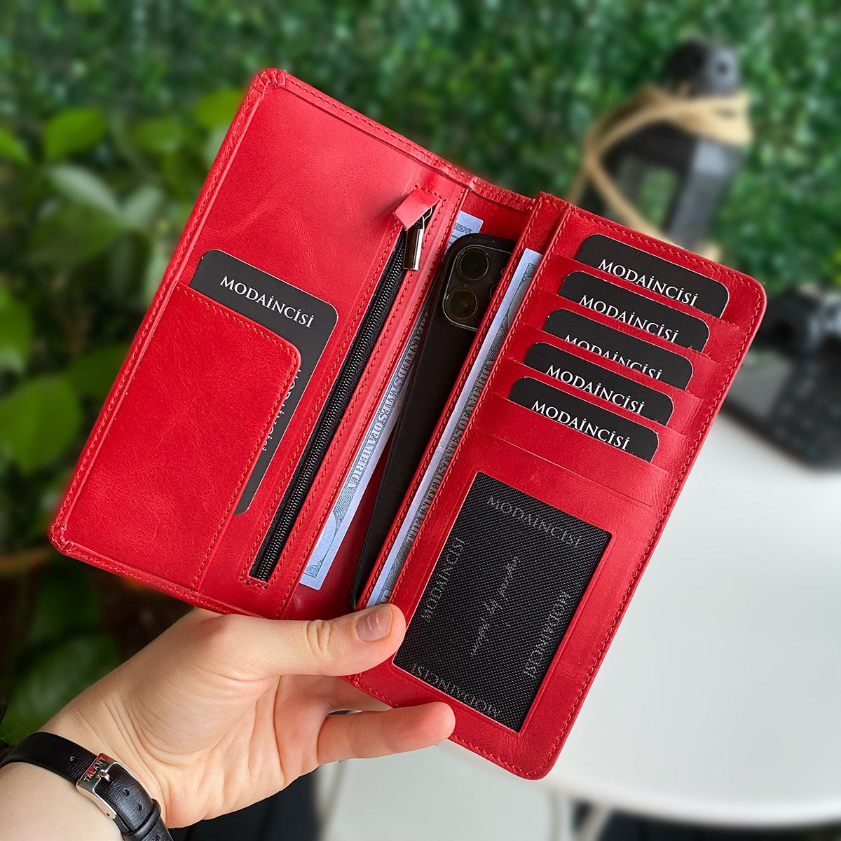 Boston Genuine Leather Wallet featuring a phone socket and multiple compartments in a stylish design.