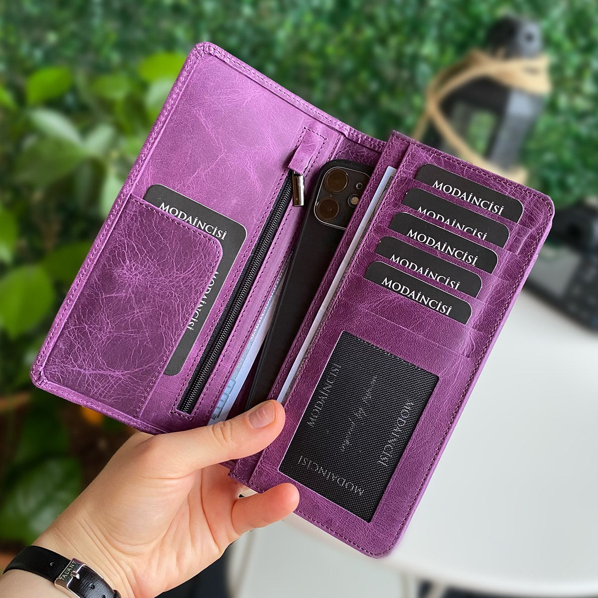 Boston Genuine Leather Wallet featuring a phone socket and multiple compartments in a stylish design.