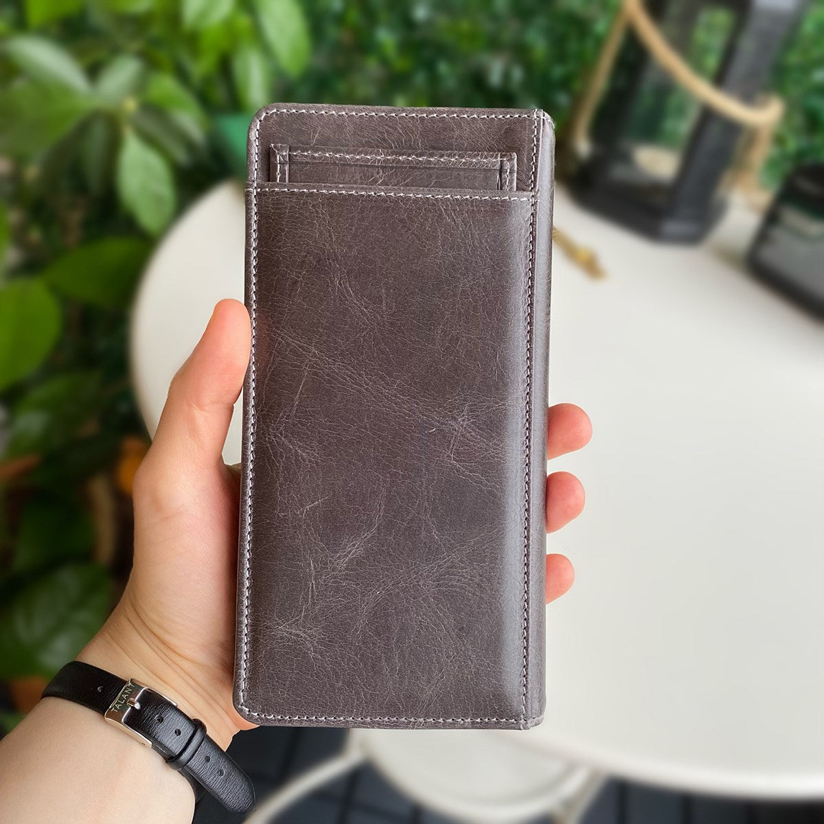 Boston Genuine Leather Wallet featuring a phone socket and multiple compartments in a stylish design.