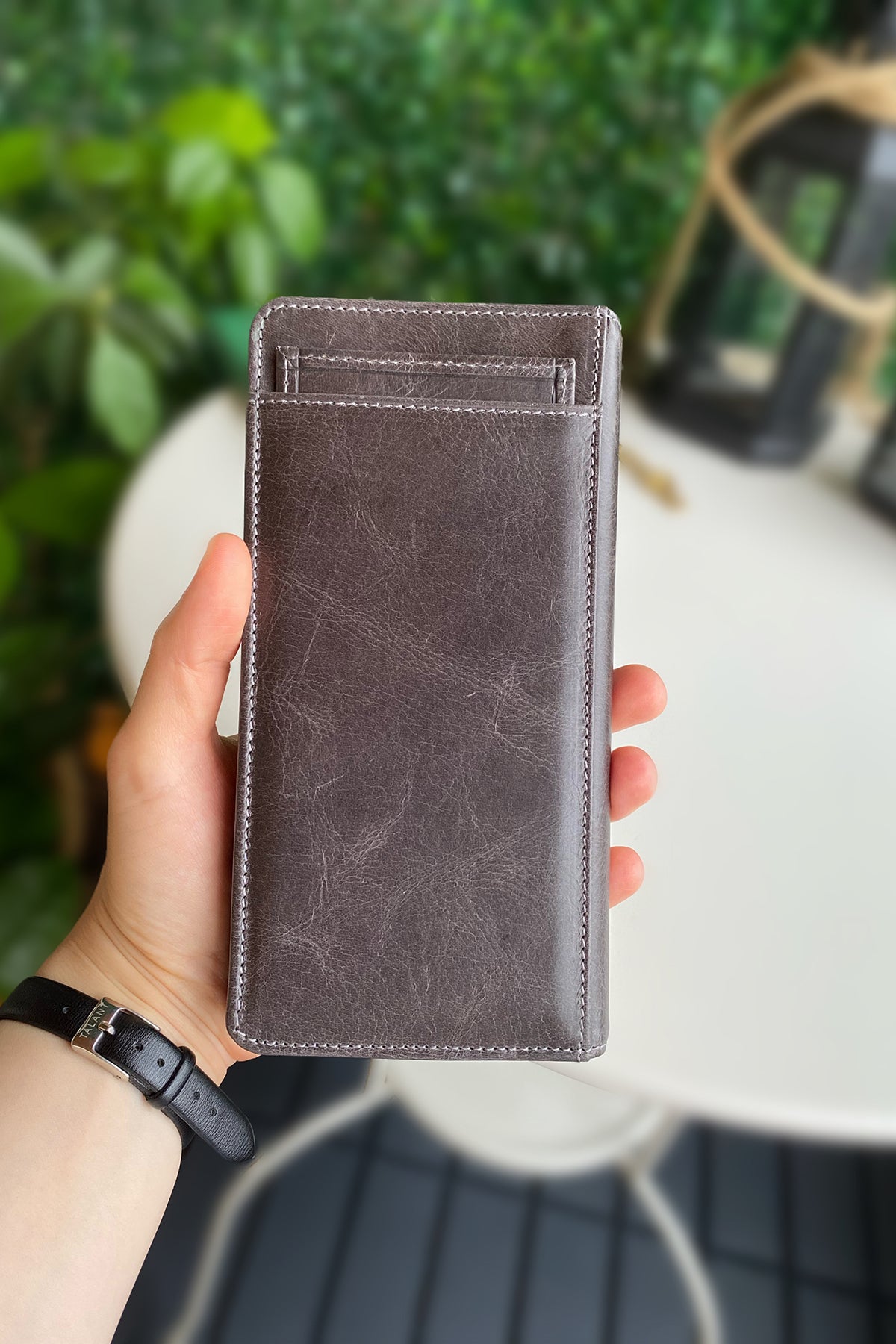 Boston Genuine Leather Wallet featuring a phone socket and multiple compartments in a stylish design.