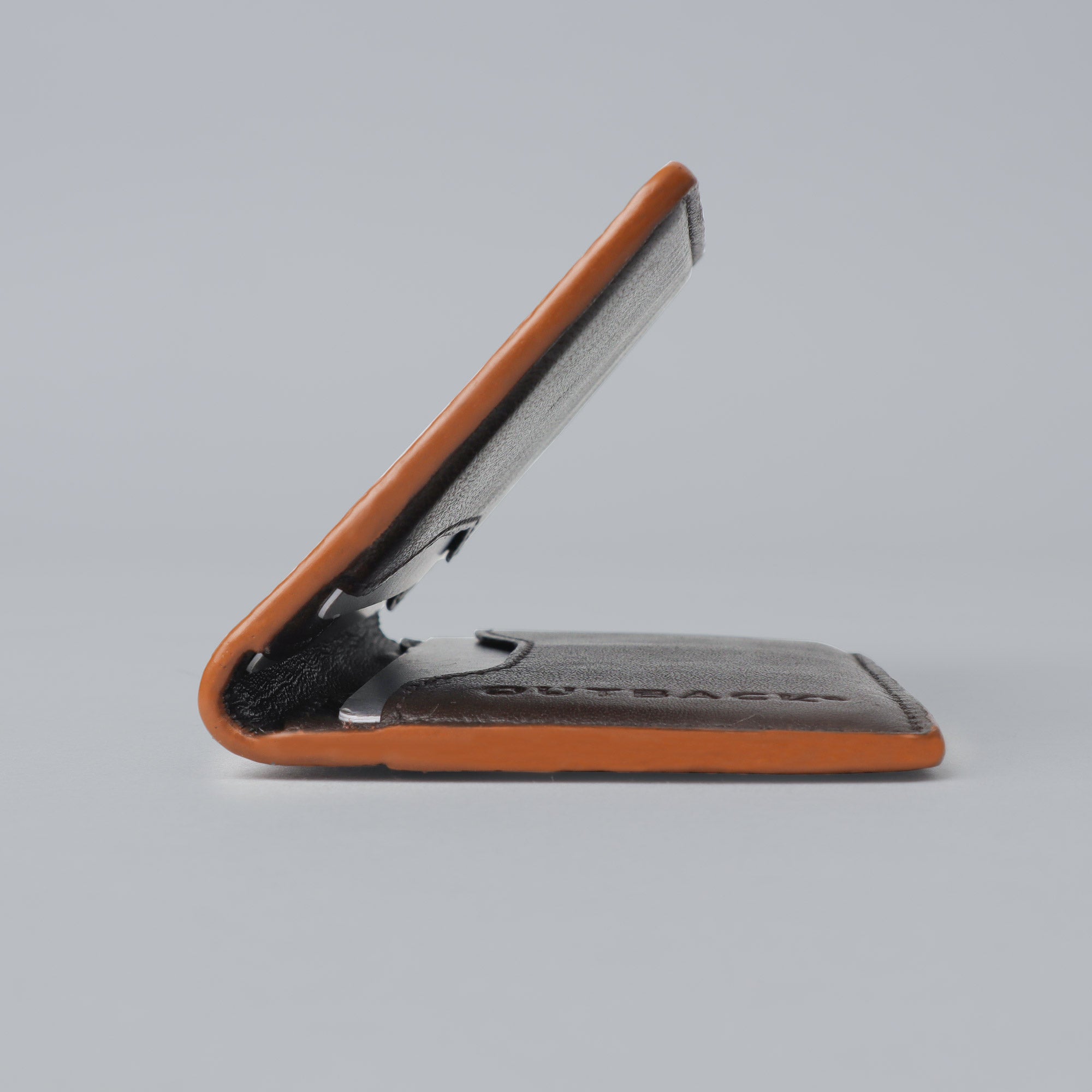 A stylish Business Cards Leather Wallet made from premium full grain leather, featuring multiple pockets for business cards and a sleek design.