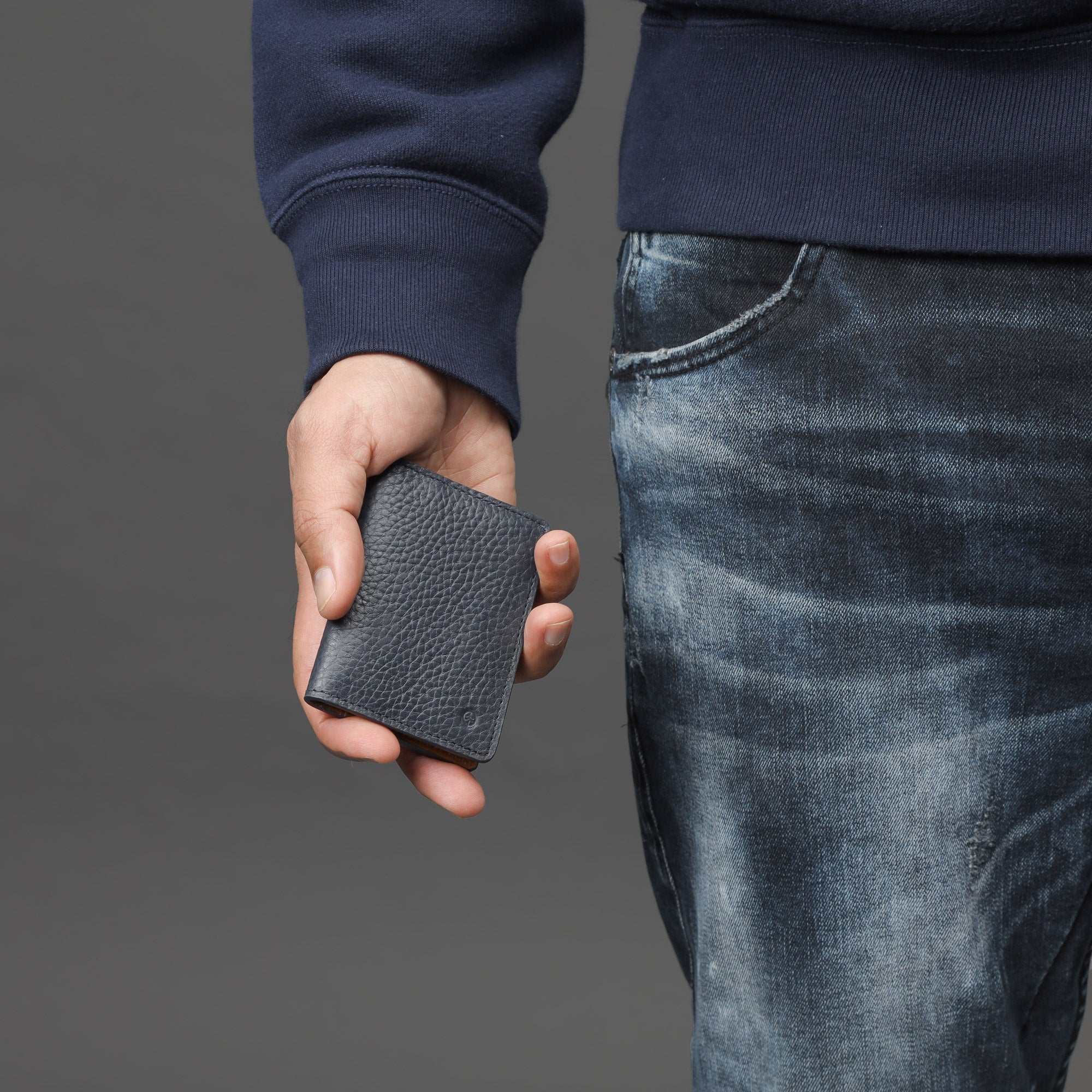 A sleek Business Cards Leather Wallet made from premium full grain leather, featuring multiple pockets for business cards, showcasing its elegant design.