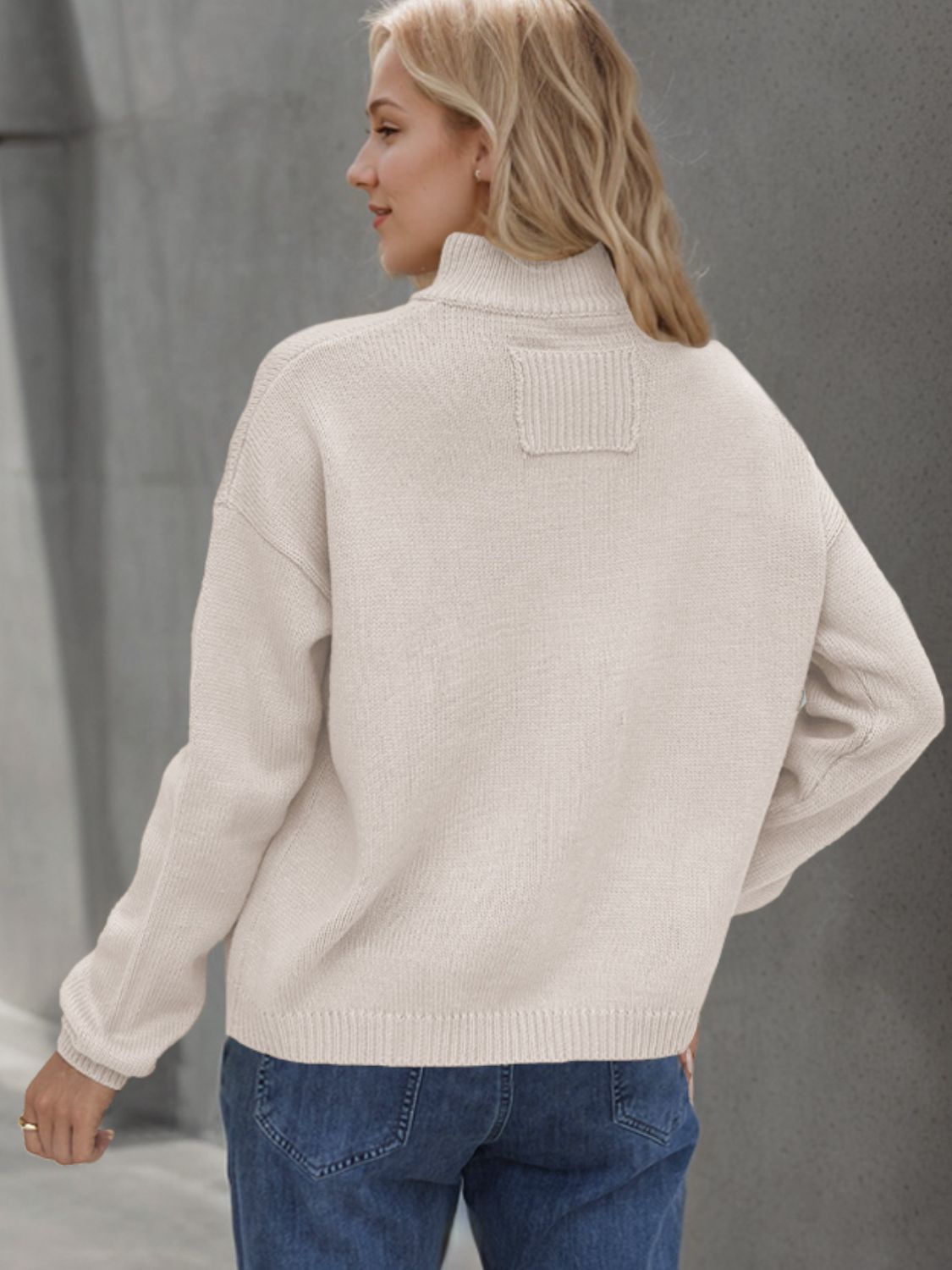 A stylish Button Up Long Sleeve Cardigan in a cozy fabric, featuring buttons and pockets, perfect for layering in cooler weather.