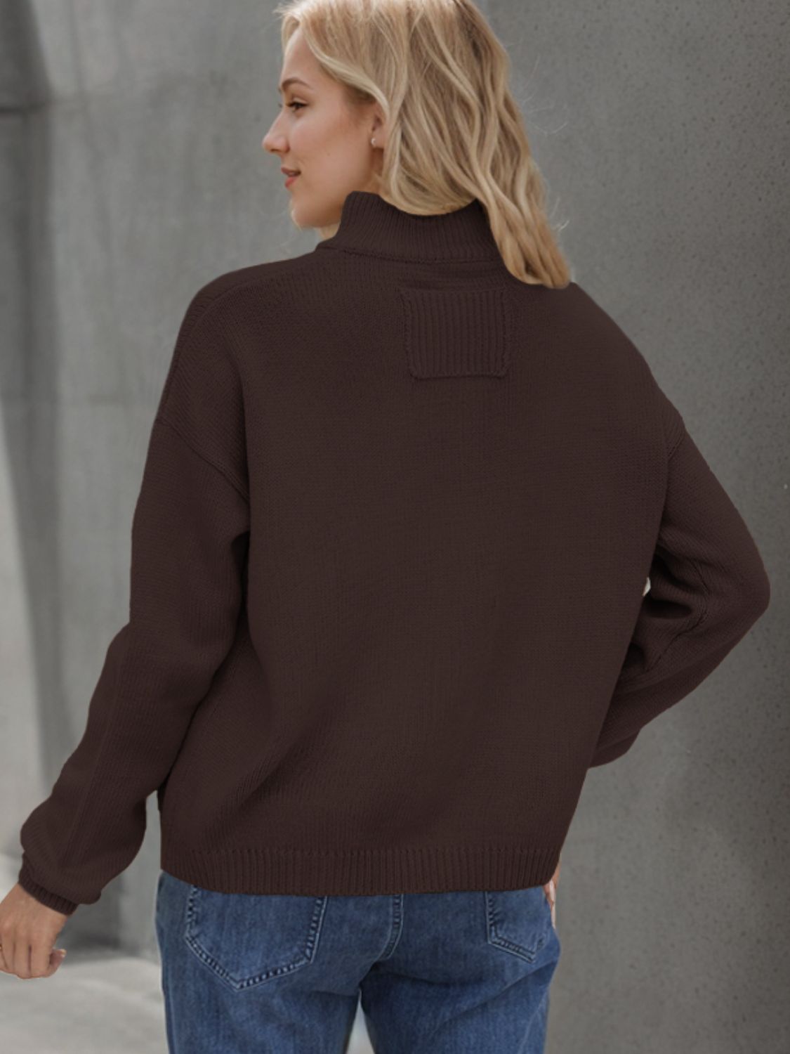 A stylish Button Up Long Sleeve Cardigan in a cozy fabric, featuring buttons and pockets, perfect for layering in cooler weather.