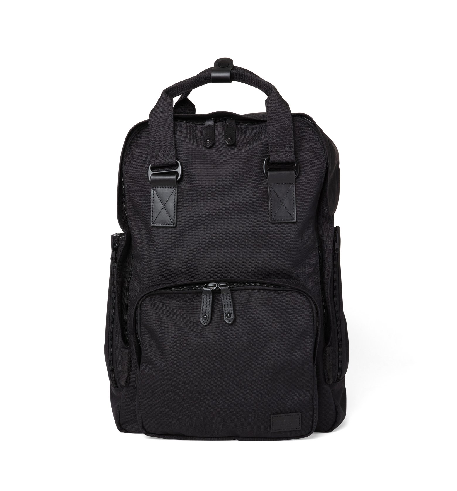 Cama Large Black backpack featuring a sleek design, padded laptop sleeve, and multiple storage pockets, made from water repellent nylon with leather accents.