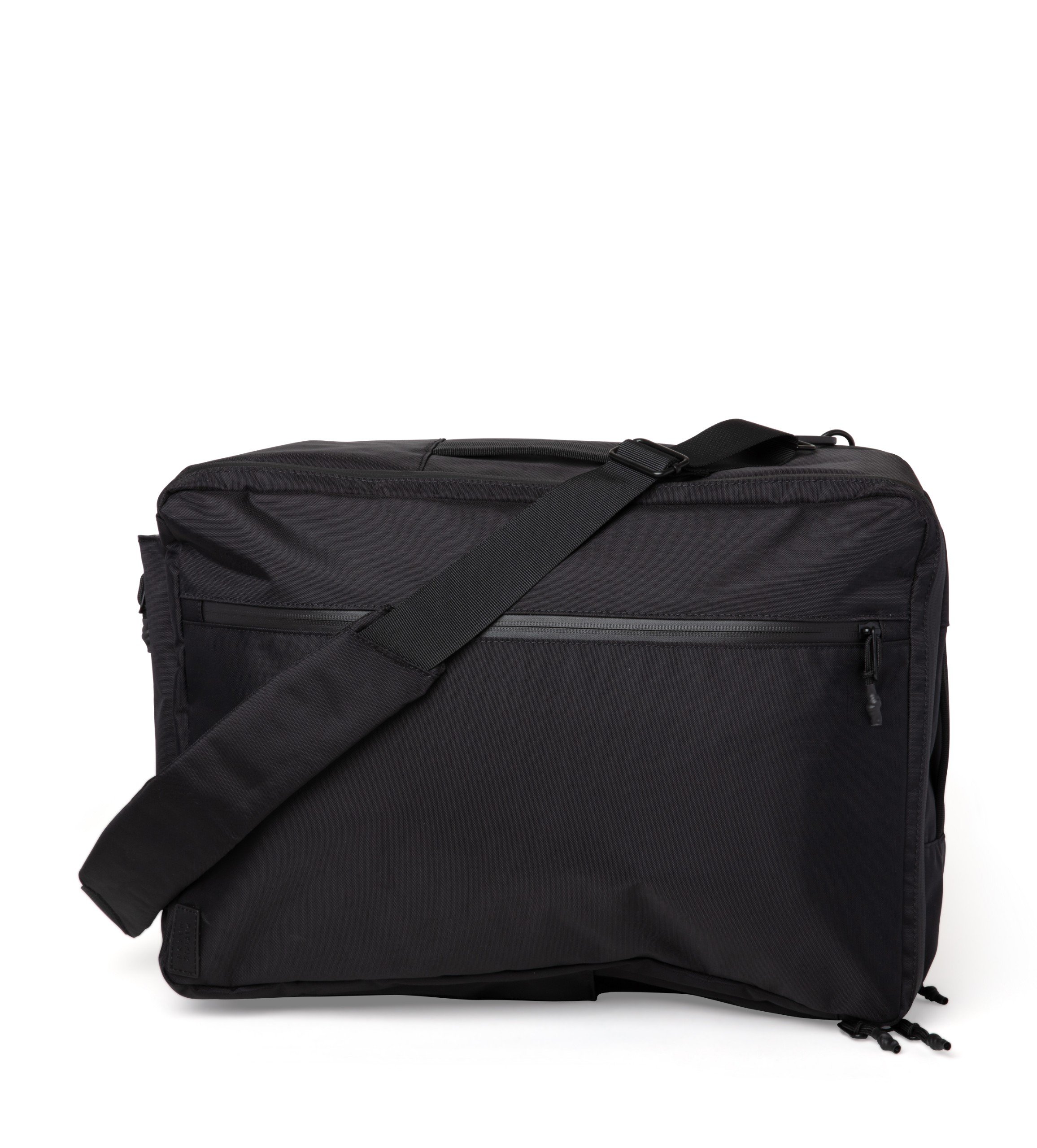 Carri Black Backpack showcasing its sleek design, water-repellent nylon material, and multiple carrying options.