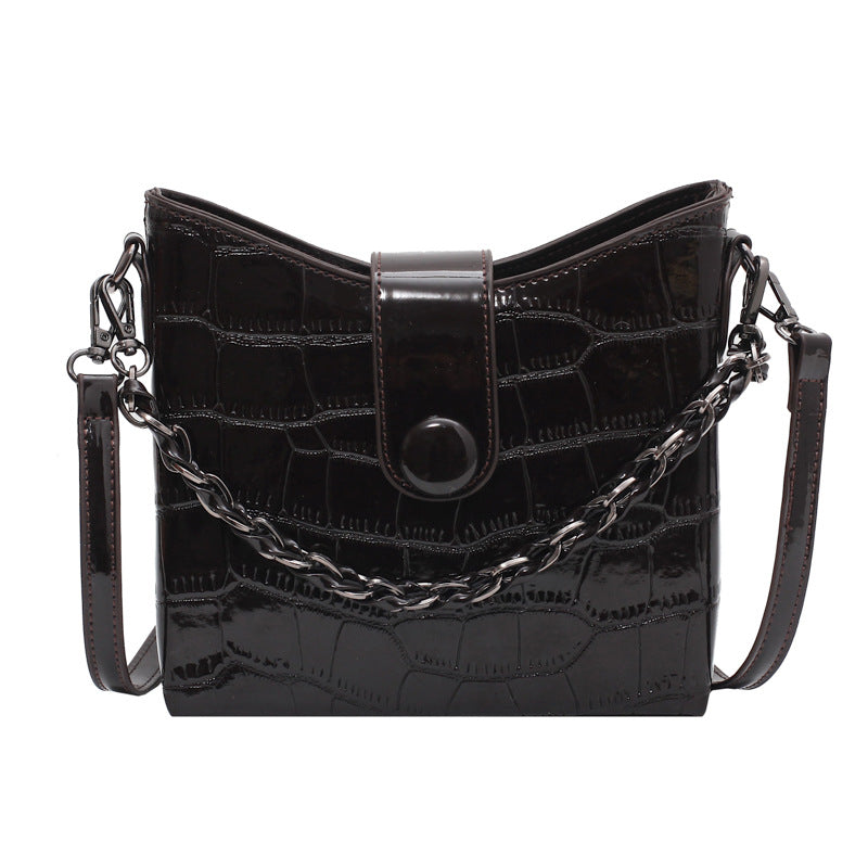 A stylish light-weight portable crossbody bag for ladies, featuring a dumpling shape and made from durable PU fabric, perfect for everyday use.