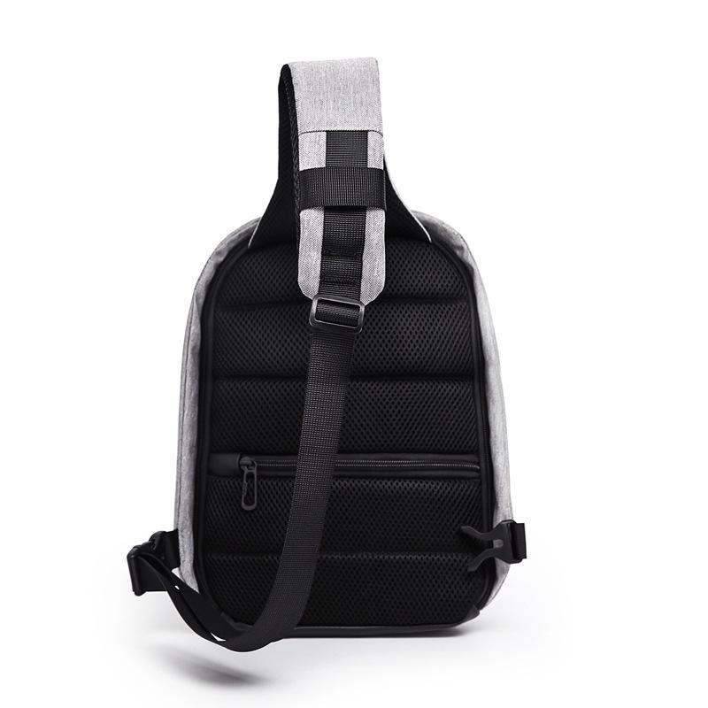 Casual Waterproof Anti-theft Unisex Chest Bag made from durable Oxford material, featuring multiple pockets and a sleek design.