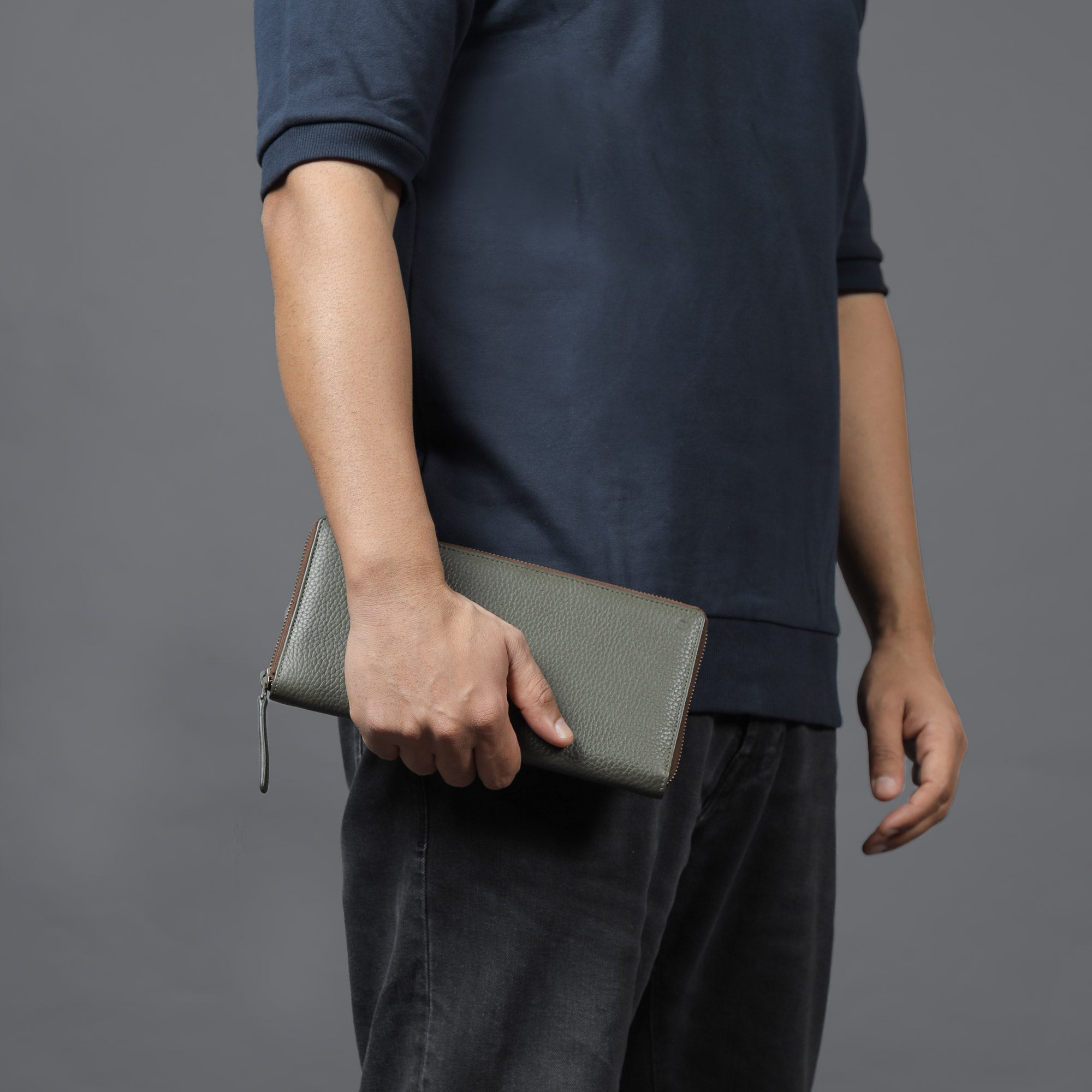 A stylish Cheque Book Leather Wallet made from premium full grain leather, featuring multiple pockets and a secure zipper closure.