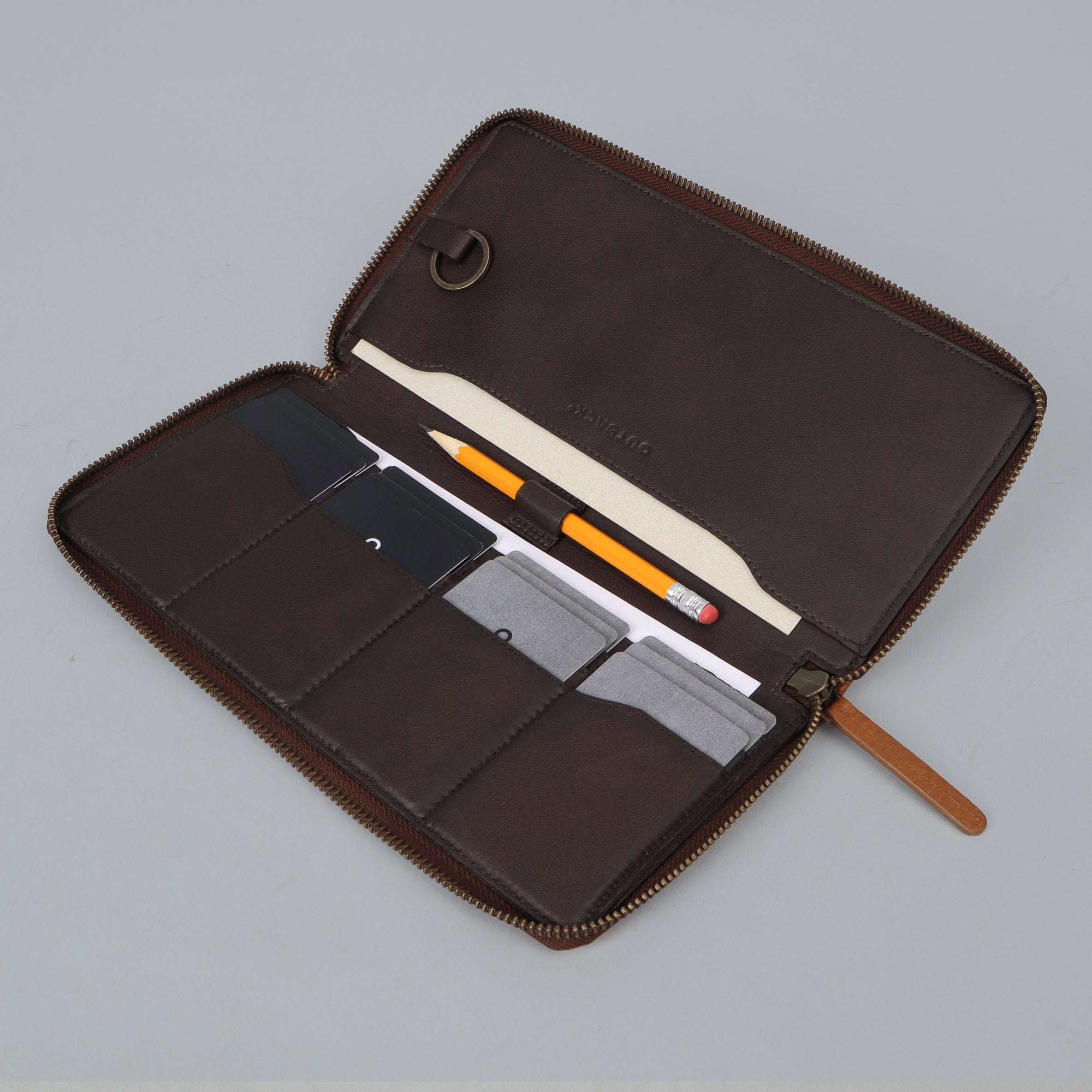 A stylish Cheque Book Leather Wallet made from premium full grain leather, featuring multiple pockets and a secure zipper closure.