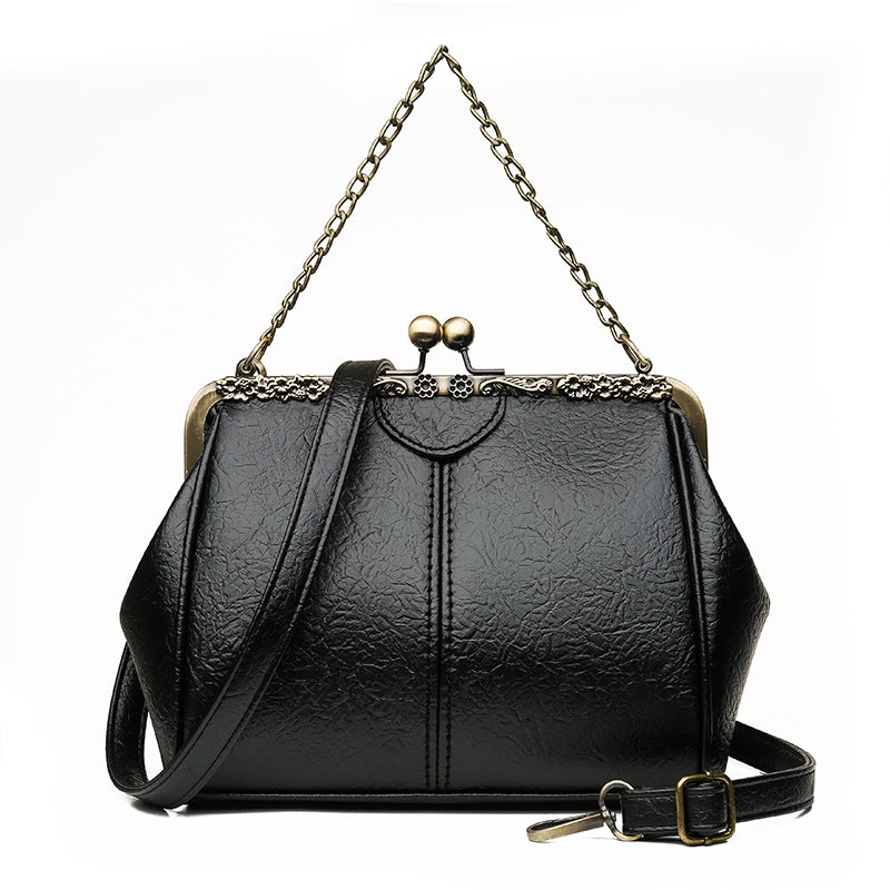Classic Small and Fresh Women's Chain Bag with diamond accents and chain handle, showcasing a stylish PU exterior.