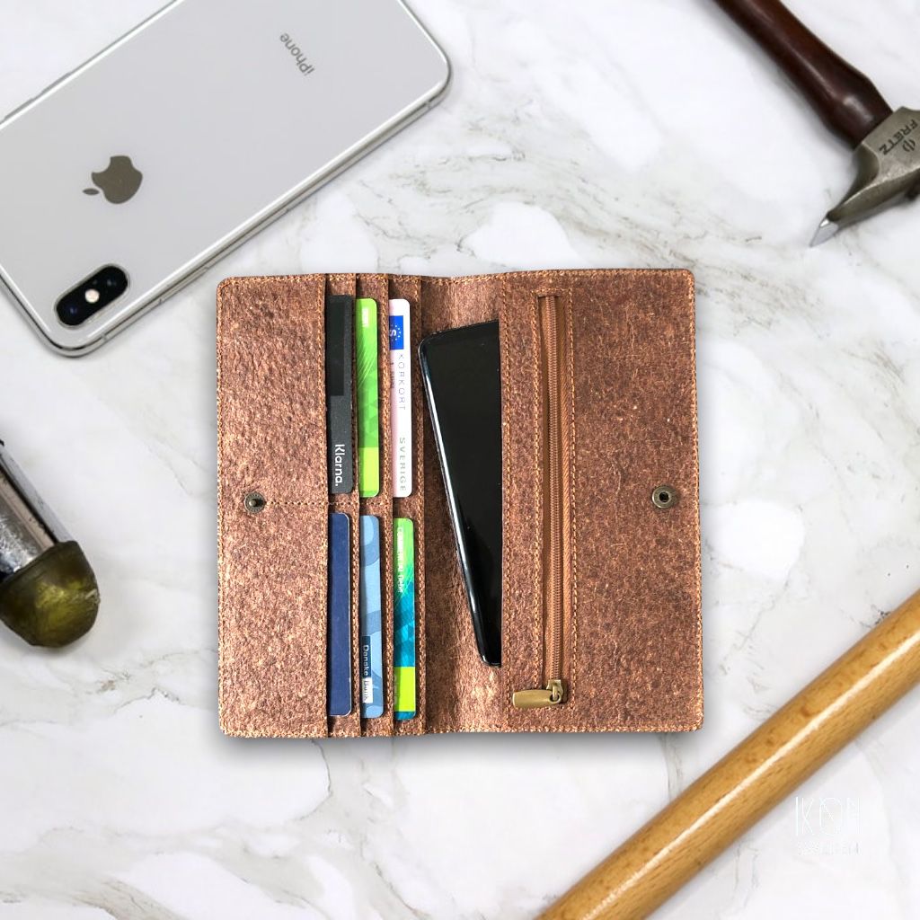 Coconut Leather Slim Wallet in Cutch Brown with card slots and zip pocket, showcasing its elegant design and eco-friendly material.