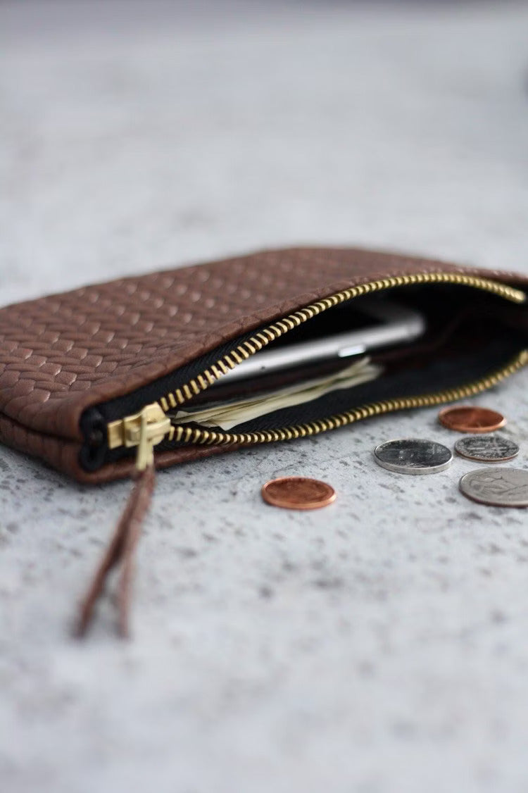Coffer Mini Handwoven Leather Zipper Clutch in Tan Brown, showcasing its handwoven texture and compact design.