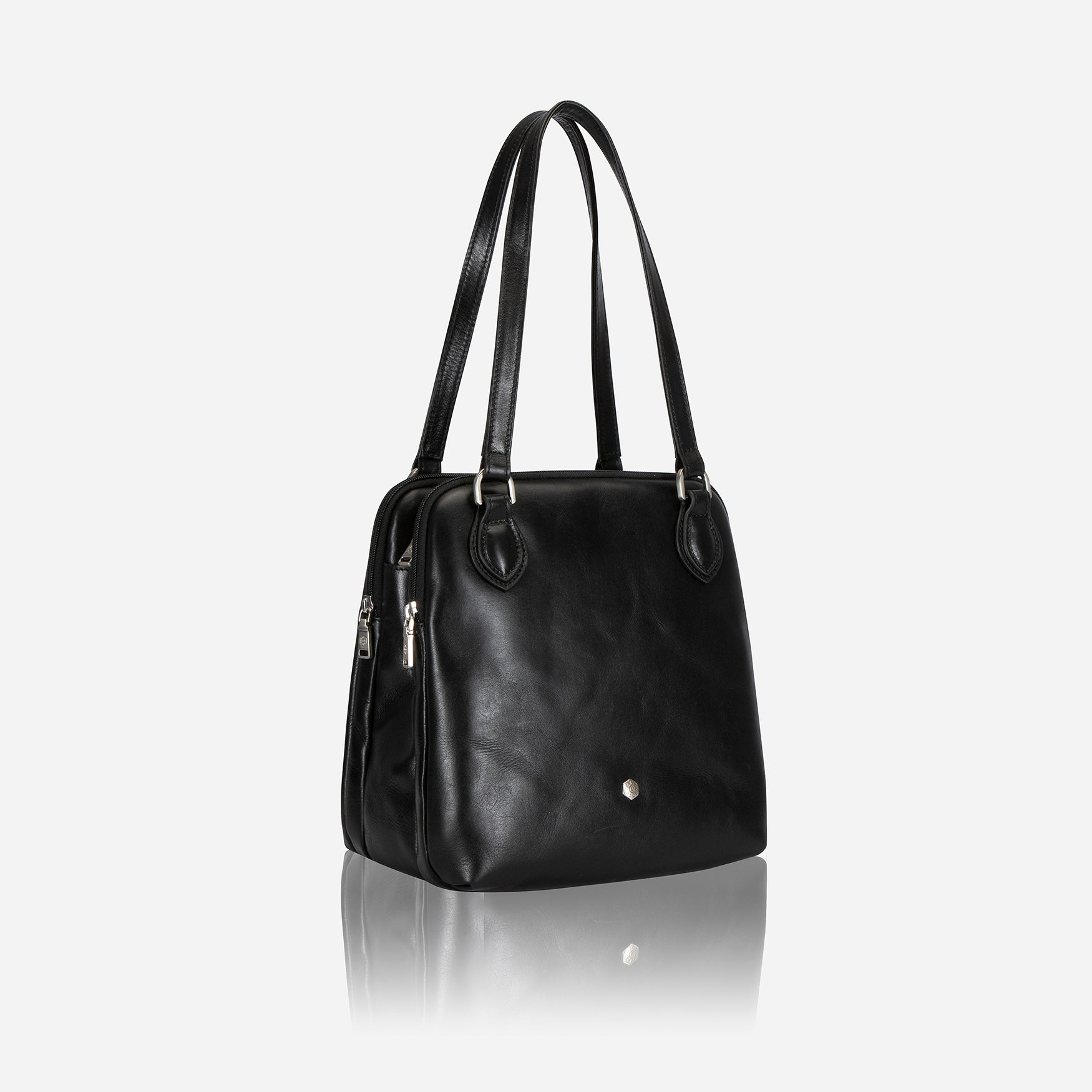 Compact Ladies Handbag in Black, elegantly designed to hold essentials like tablets, keys, and makeup.