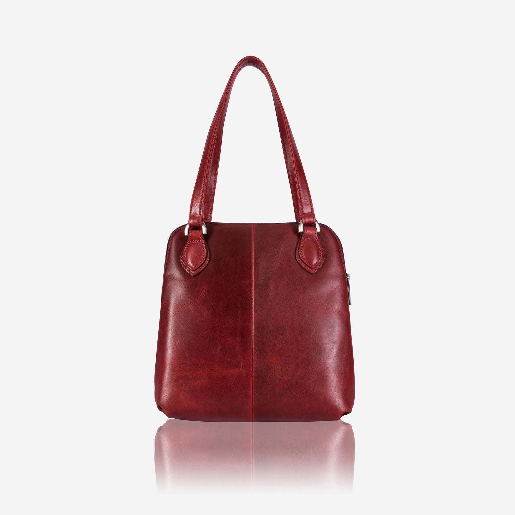 Compact Ladies Handbag in Rust, showcasing its elegant design and spacious interior for essentials.