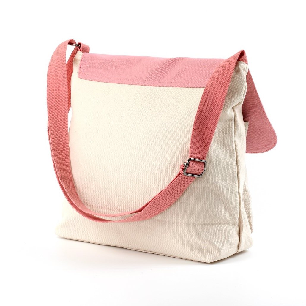 Stylish two-tone cross body bag made of durable canvas, featuring adjustable strap and multiple pockets.