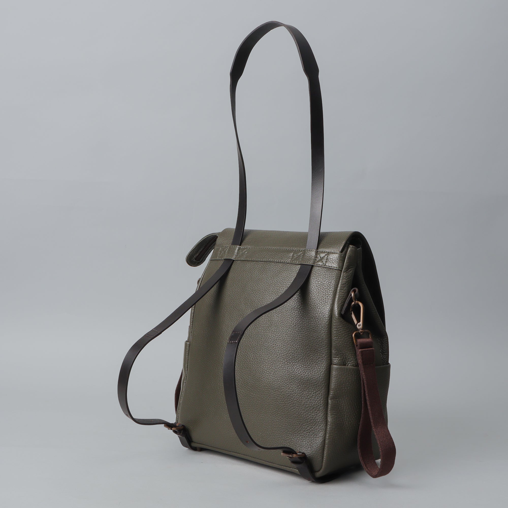 Donna Leather Diaper Bag in premium full grain leather with multiple pockets and versatile carrying options.