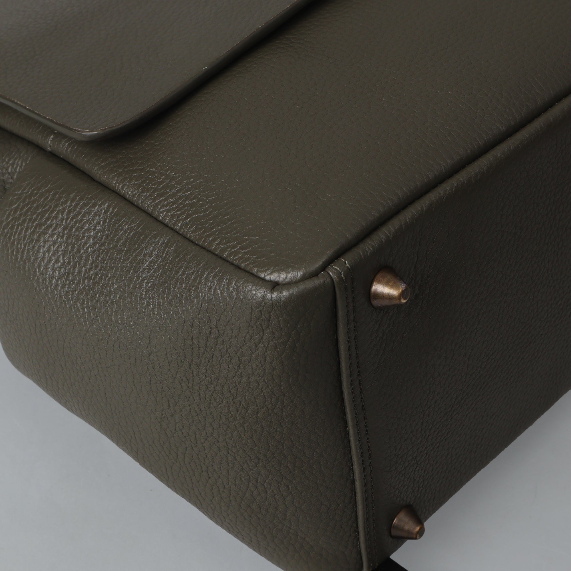 Donna Leather Diaper Bag in premium full grain leather with multiple pockets and versatile carrying options.