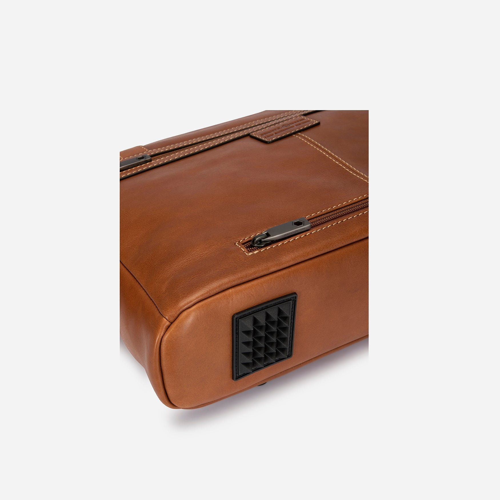Double Buckle Laptop Briefcase in Colt color, showcasing its vintage design and spacious interior.