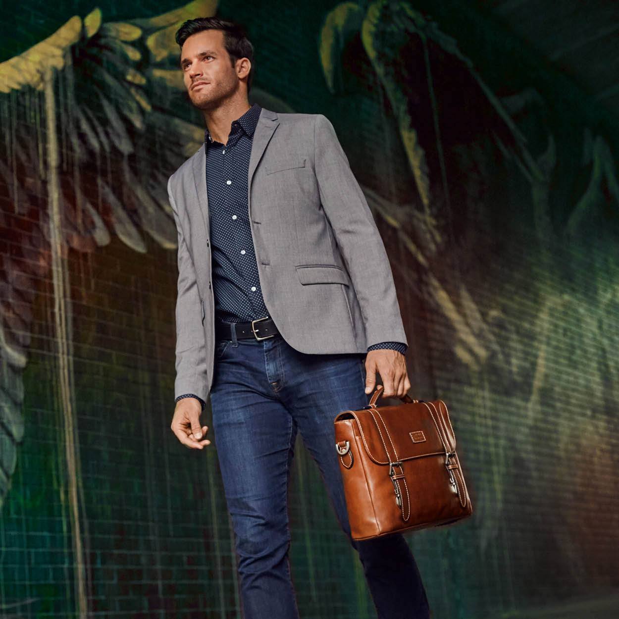 Double Buckle Laptop Briefcase in Colt color, showcasing its vintage design and spacious interior.