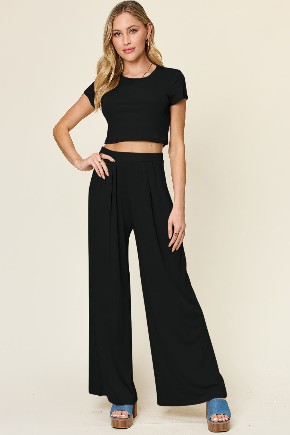 Double Take Full Size Round Neck Top and Pants Set featuring a stylish round neck design and comfortable fit, available in multiple sizes.