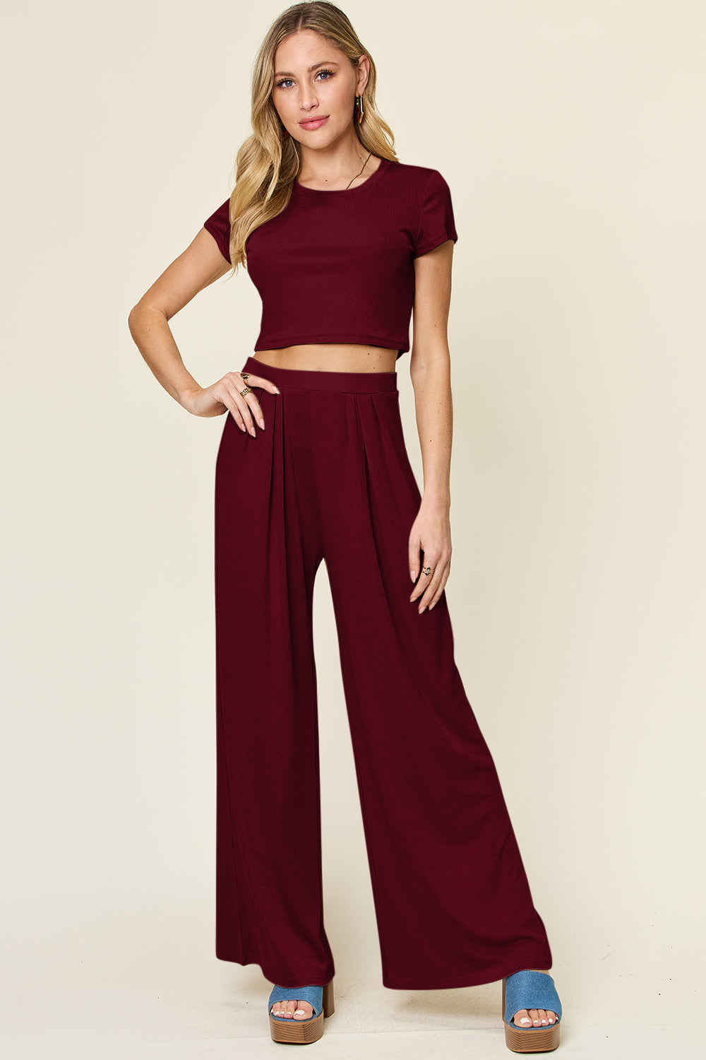 Double Take Full Size Round Neck Top and Pants Set featuring a stylish round neck design and comfortable fit, available in multiple sizes.