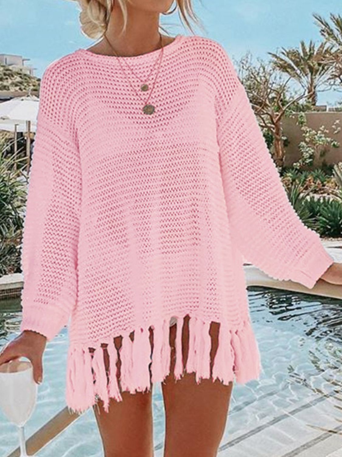 Double Take Openwork Tassel Hem Long Sleeve Knit Cover Up featuring an openwork design and playful tassel hem.
