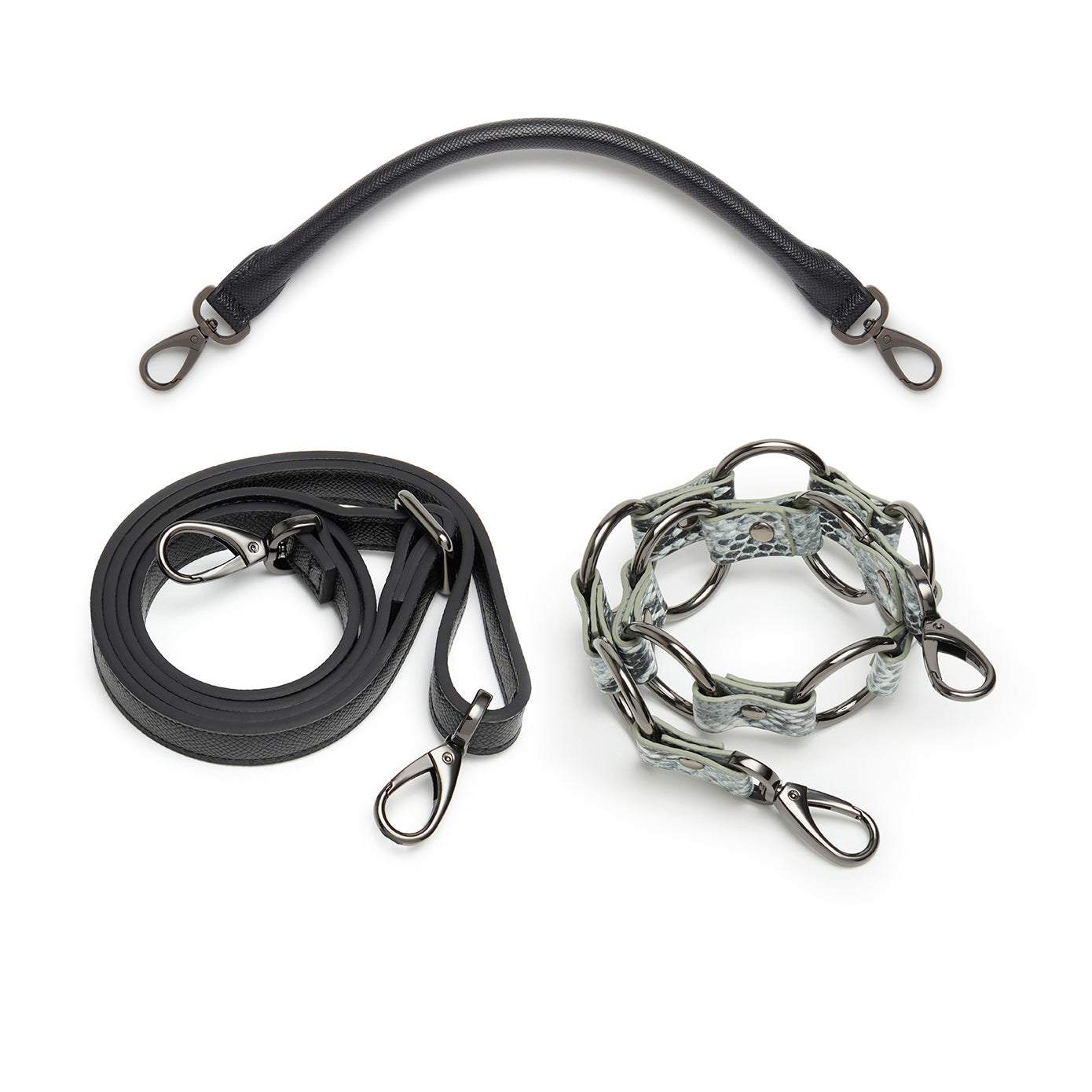 Elm Shoulder Bag in Black made from premium vegan leather, featuring a flap closure, adjustable strap, and faux snake designer strap.