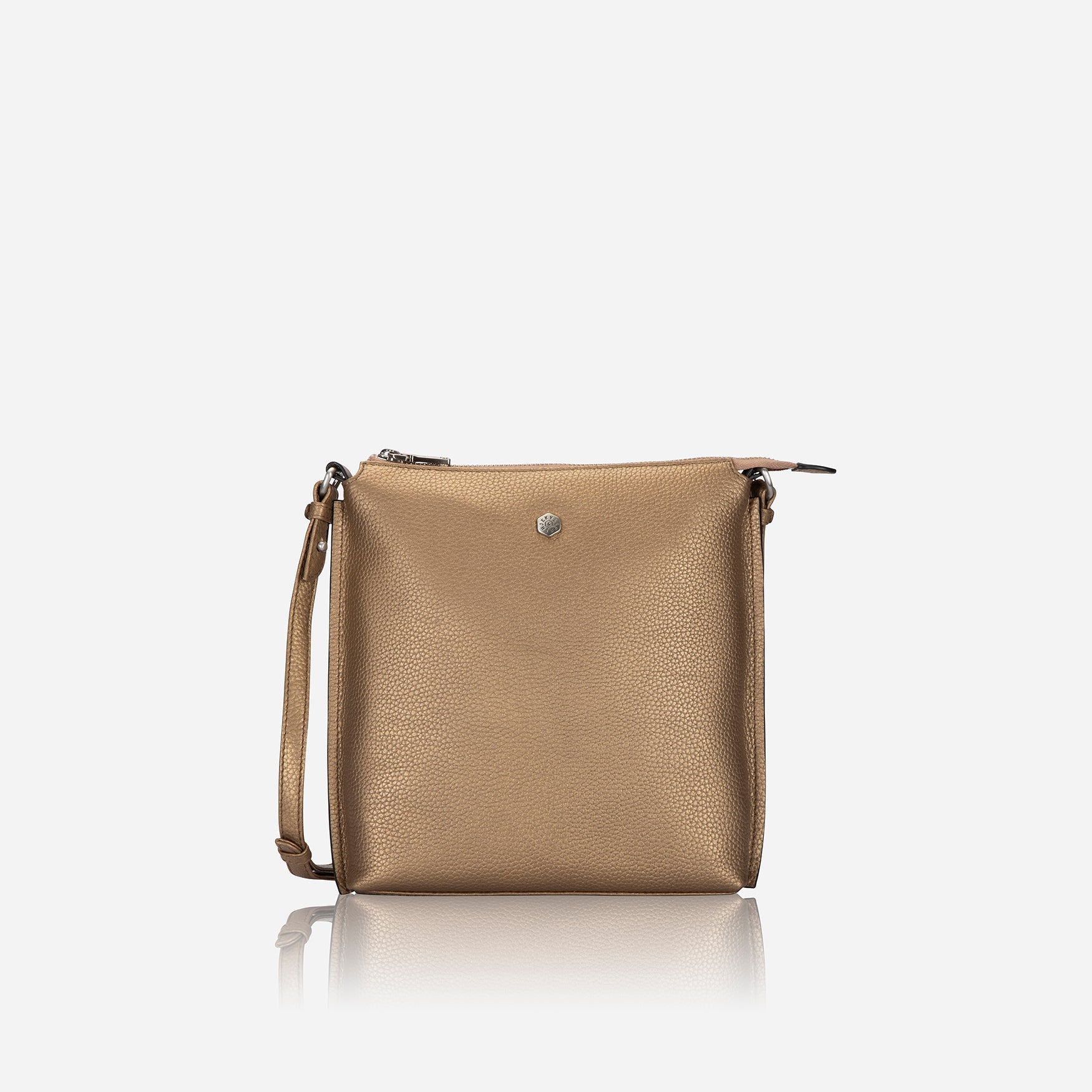 Stylish bronze leather Essentials Crossbody Bag with adjustable strap, perfect for day or night outings.