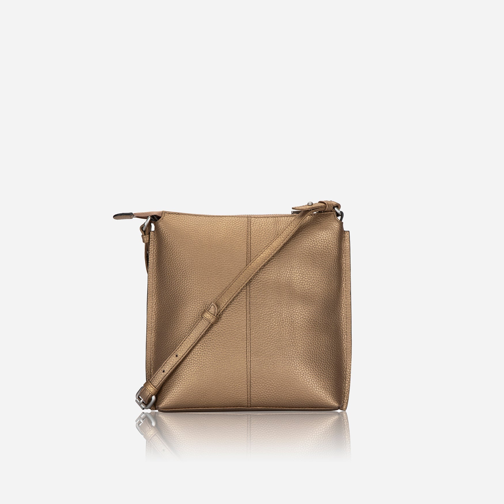 Stylish bronze leather Essentials Crossbody Bag with adjustable strap, perfect for day or night outings.