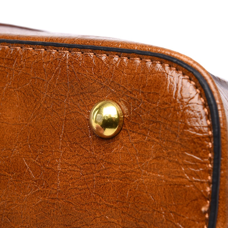 Ethnic Style Flower Pattern Female Messenger Bag featuring a vibrant floral design, medium size, and soft handle for comfortable carrying.