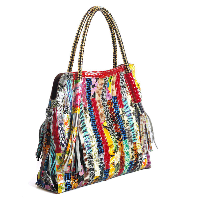 European and American Lady's Portable Striped Handbag featuring a stylish striped design, tassel detail, and durable cowhide material.