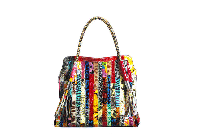 European and American Lady's Portable Striped Handbag featuring a stylish striped design, tassel detail, and durable cowhide material.