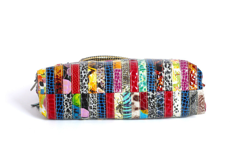 European and American Lady's Portable Striped Handbag featuring a stylish striped design, tassel detail, and durable cowhide material.