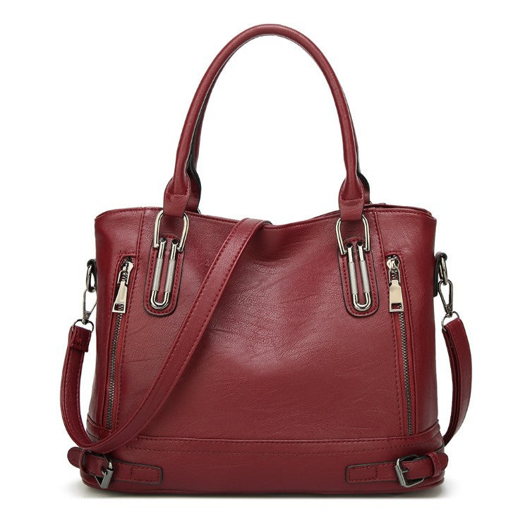 A stylish European and American style classic messenger bag for women, featuring a trendy oval shape and made from durable PU material.