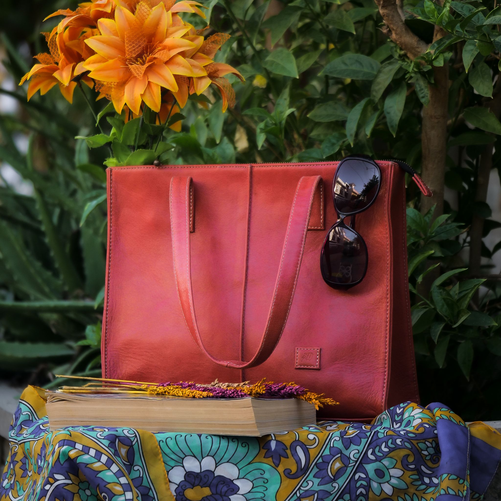Everyday Women's Leather Zipper Tote Bag in Candy Red, showcasing its spacious design, premium cow leather material, and stylish hardware.
