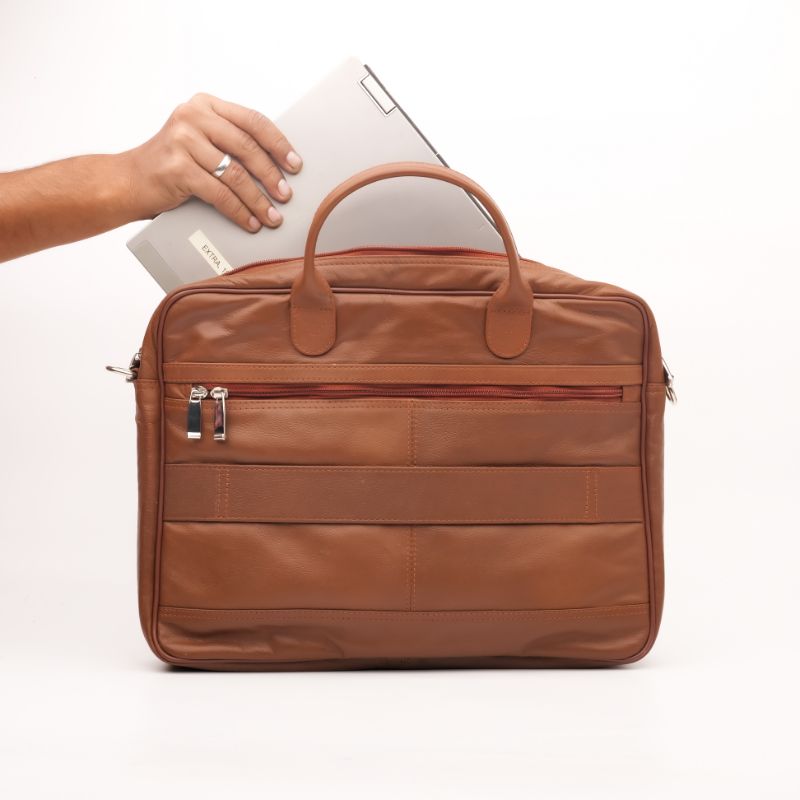 Executive Leather Laptop Bag in tan color, crafted from genuine cow leather, featuring adjustable shoulder strap and spacious compartments.