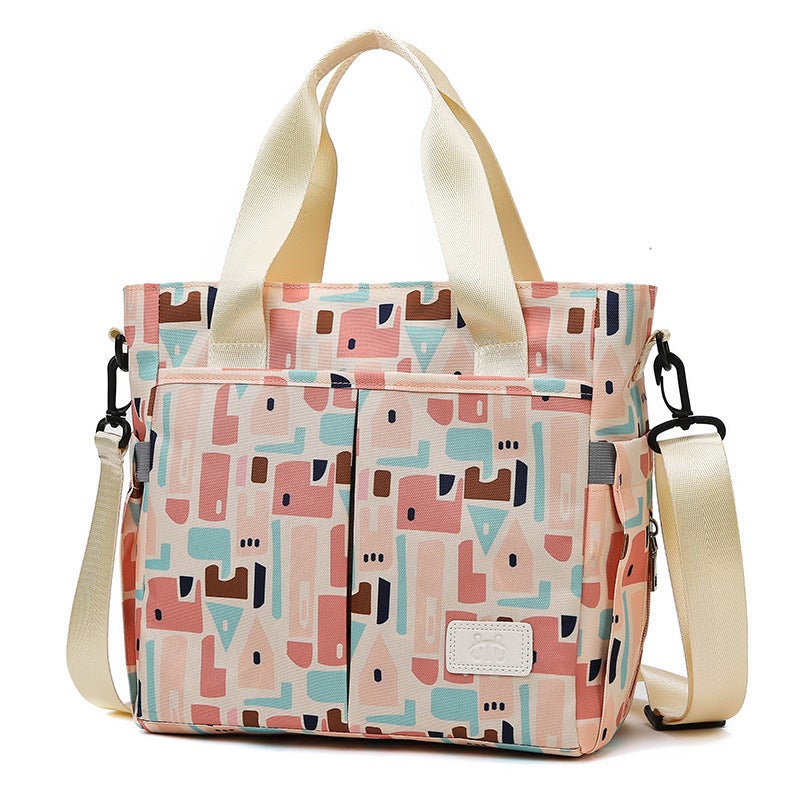 Fashion One-shoulder Lightweight Large-capacity Mommy Bag in stylish design, featuring a single strap and spacious interior.