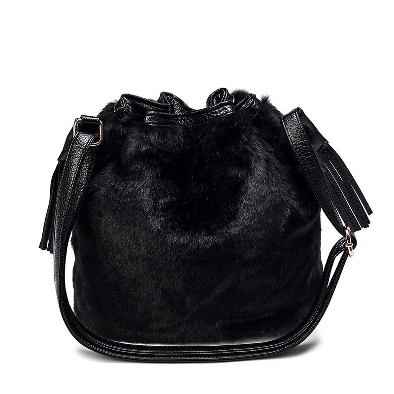 Fashion Plush Handbag for Women, featuring a soft plush exterior, bucket shape, and stylish design with a single strap.