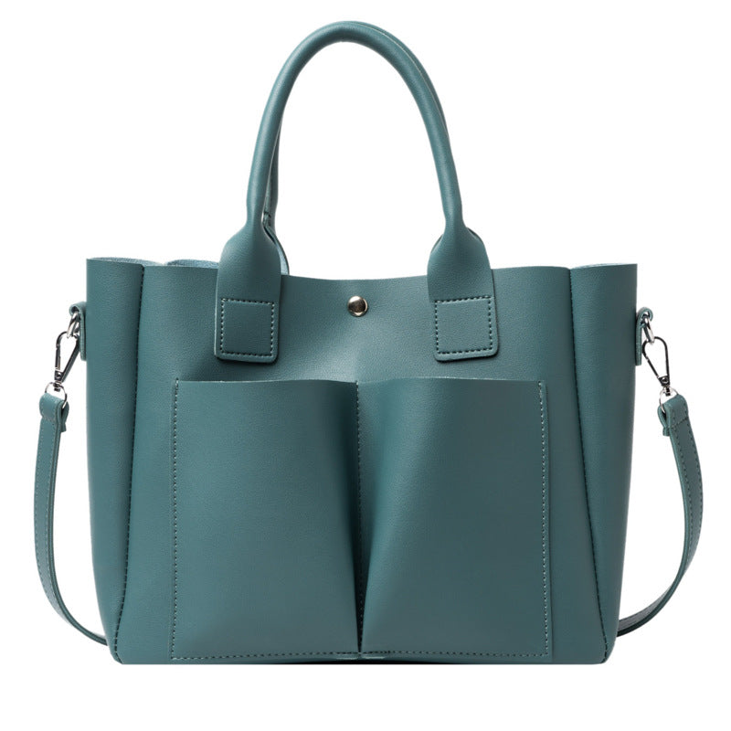 Fashion Portable Women's Large Solid Color Messenger Bag in PU leather, featuring a trendy tote design with a magnetic buckle and adjustable strap.