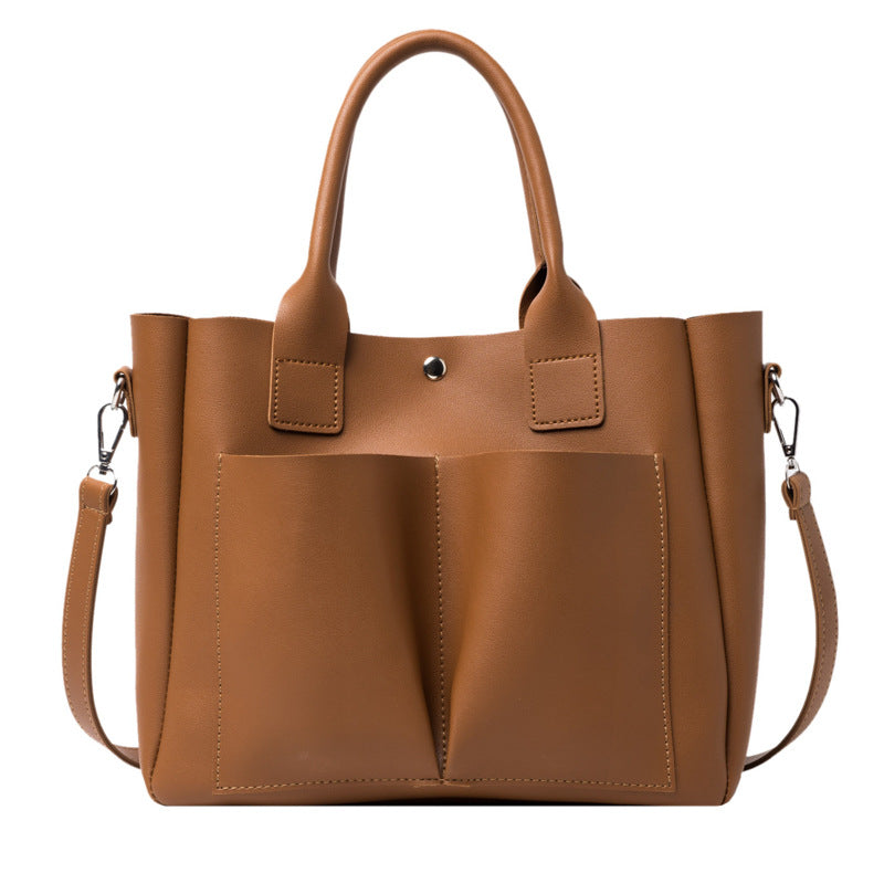 Fashion Portable Women's Large Solid Color Messenger Bag in PU leather, featuring a trendy tote design with a magnetic buckle and adjustable strap.