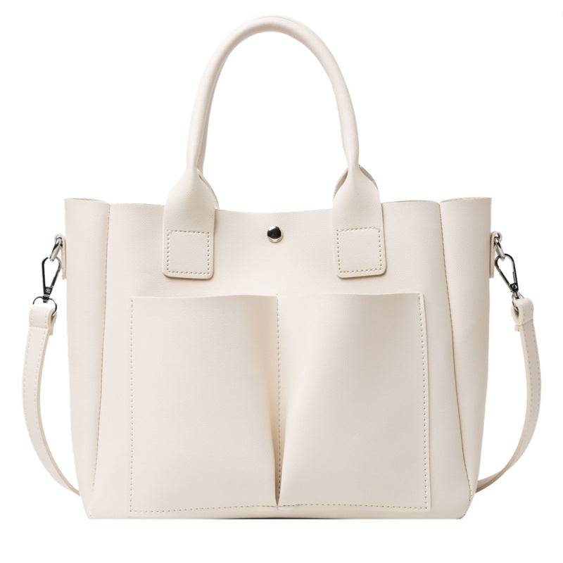 Fashion Portable Women's Large Solid Color Messenger Bag in PU leather, featuring a trendy tote design with a magnetic buckle and adjustable strap.