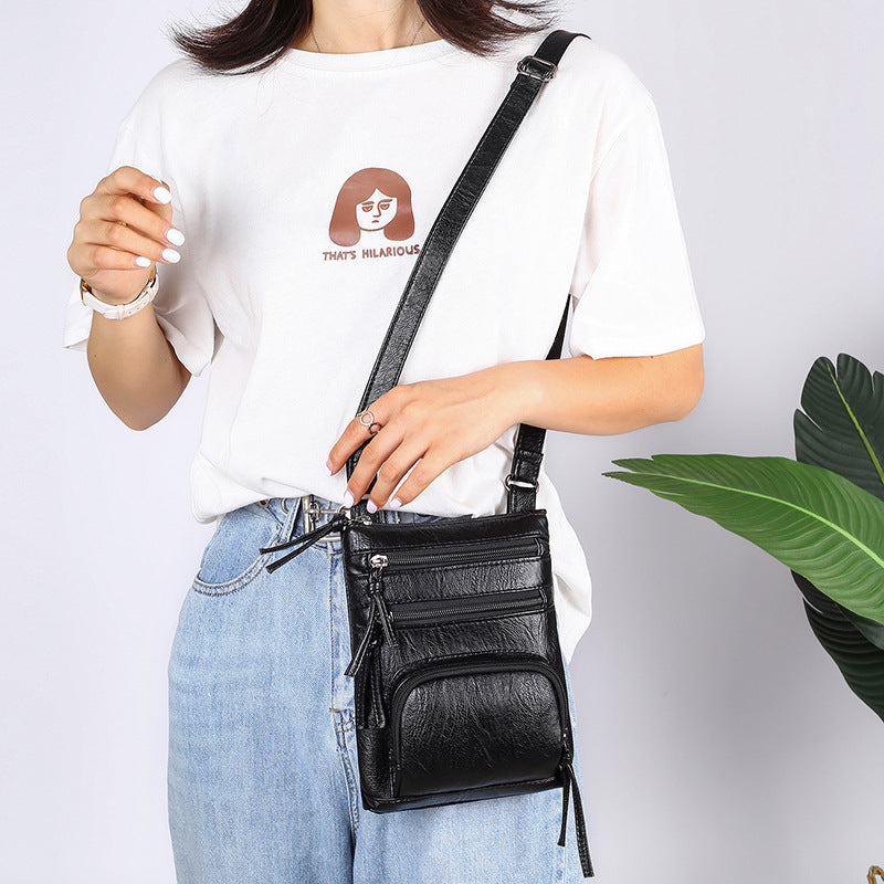 Fashion Retro Solid Color Shoulder Bag in a stylish square design, made of soft PU leather with multiple pockets for convenience.